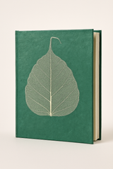 Handmade green Lokta notebook with real Bodhi leaf design, crafted from tree-free Nepali paper.